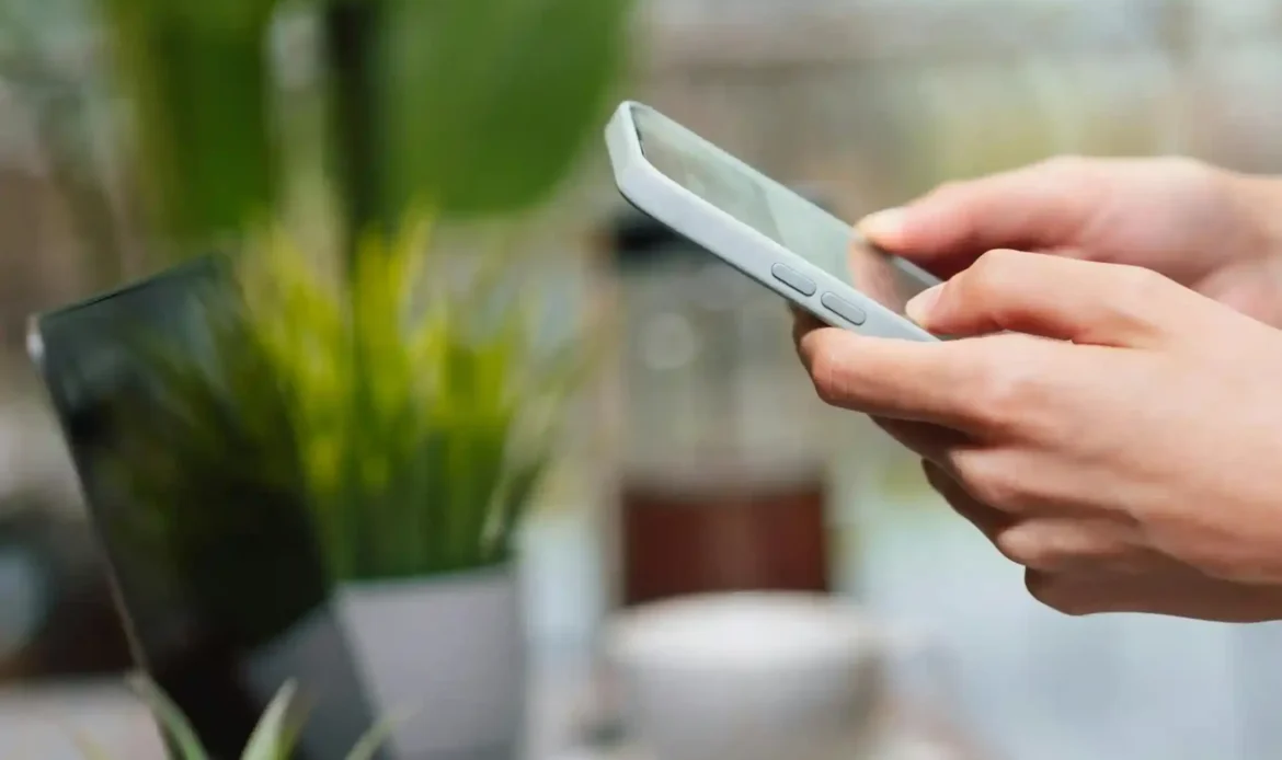 A Person Browses A Website On Their Phone.